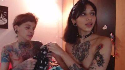 Two girls with tattoos show what they can do with hot pussy - anysex.com